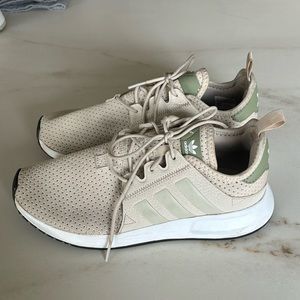 green and tan adidas tennis shoes